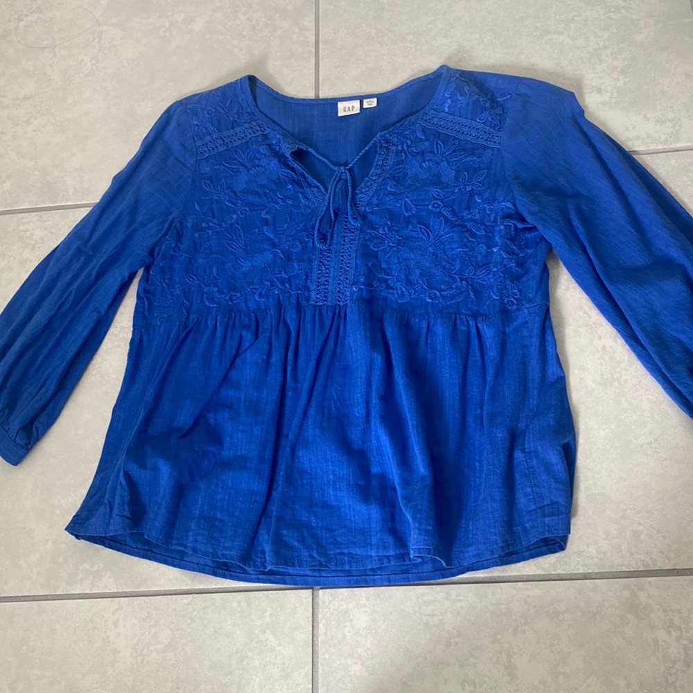 A flowy royal blue shirt
